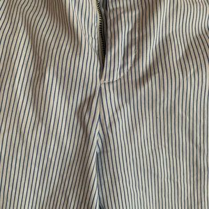 Shorts. White with small blue stripes.